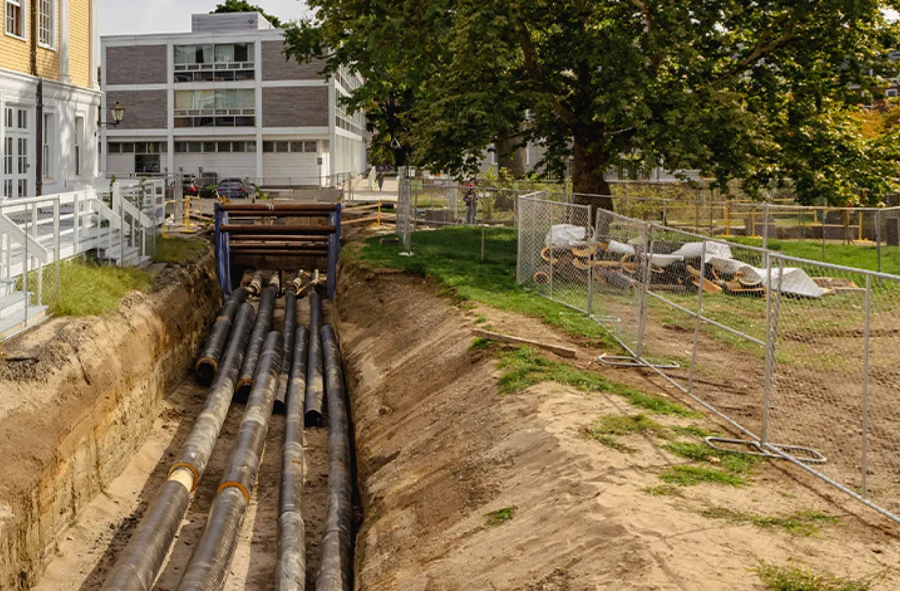 Newly laid distribution pipes next to the Davis Center